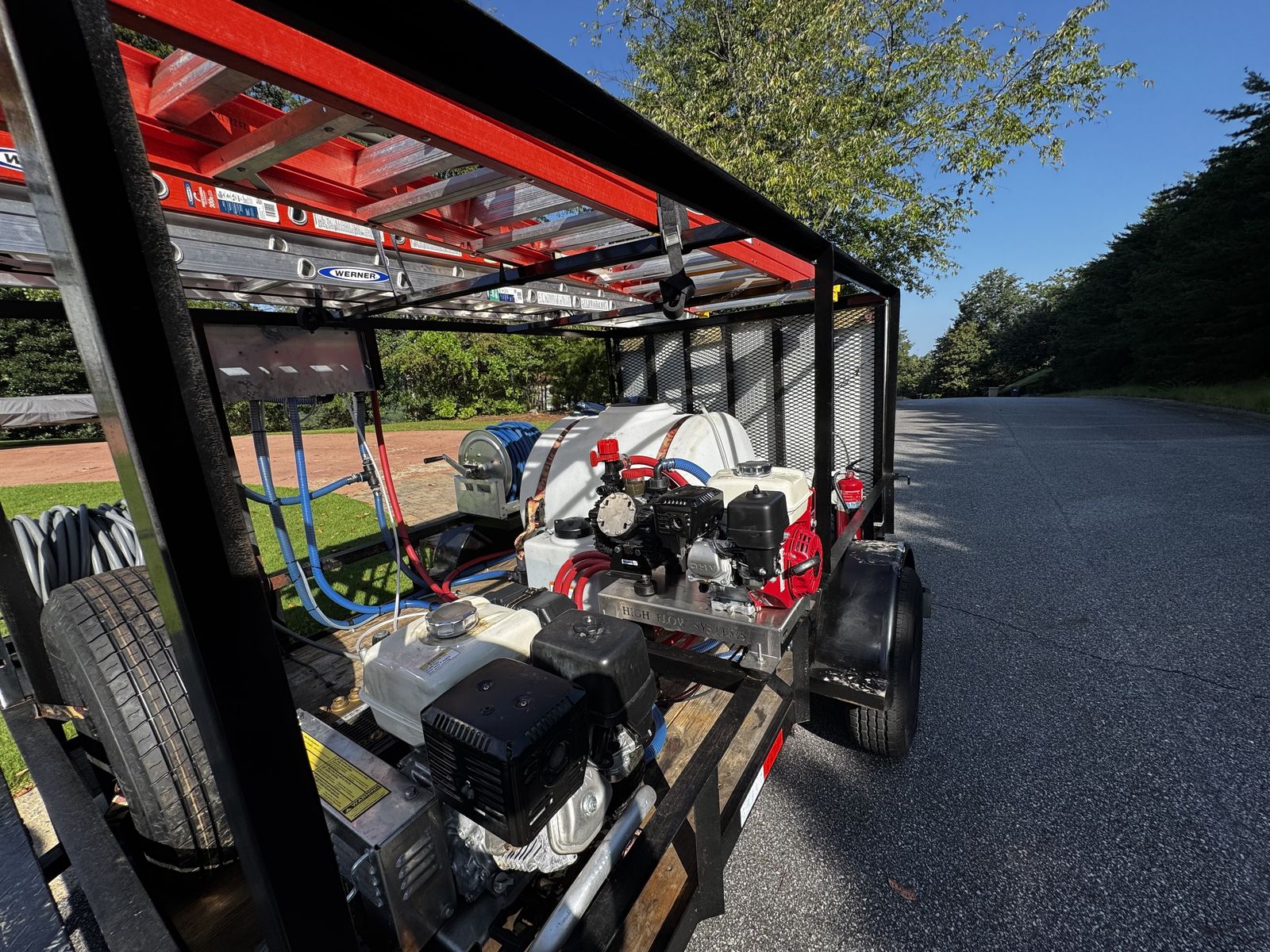 Pressure washing equipment on the trailer including engine, pump, tank and surface cleaner